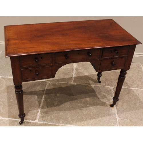 749 - A 19th century mahogany bowfront dressing table, the rectangular moulded top above an arrangement of... 