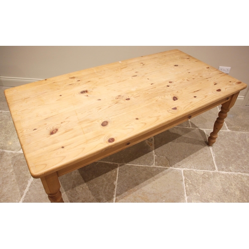 765 - A Victorian style pine kitchen table, late 20th century, the rectangular top with rounded corners, u... 