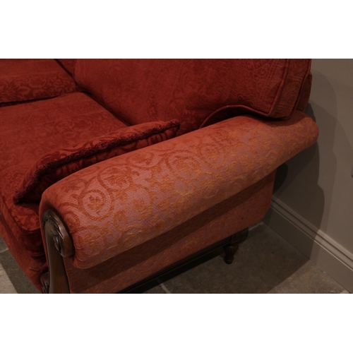 774 - An Empire style four piece lounge suite, late 20th/early 21st century, in red foliate fabric, compri... 