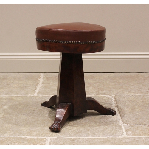 776 - A mid 19th century mahogany revolving piano stool, the later re-covered circular leather seat applie... 