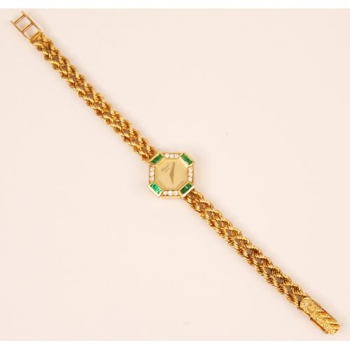 84 - A ladies Chopard emerald and diamond yellow metal wristwatch, the circular champagne coloured dial s... 