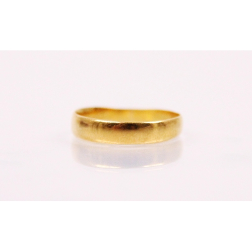 180 - A 22ct yellow gold wedding band, sponsors mark 'H.A' Birmingham possibly 1926, ring size L, 1.8gms