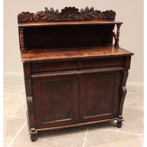 721 - A William IV mahogany chiffonier sideboard, the raised back with a leaf and shell carved pediment ab... 