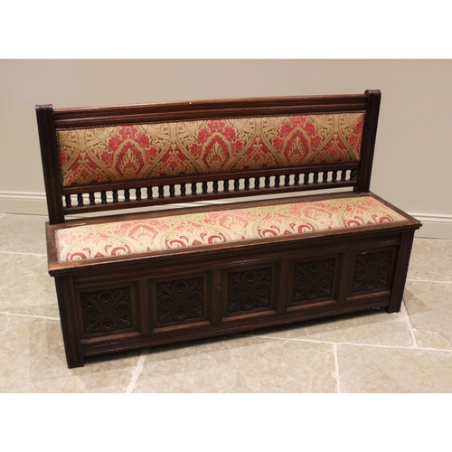 756 - An upholstered oak box settle, stamped Gillows, Lancaster, late 19th/early 20th century, the padded ... 