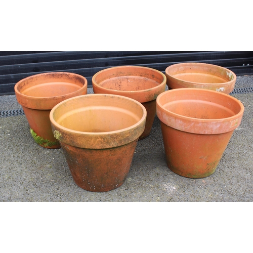 812 - Five large terracotta planters, of typical tapering form, 35cm H x 43cm D (5)