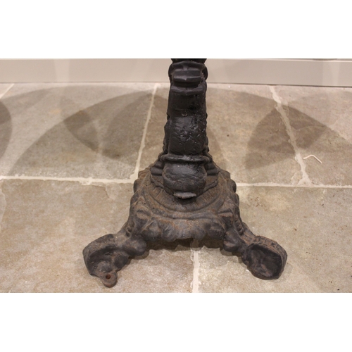 830 - A trio of Victorian cast iron and hardwood two tier pub or bar tables, the two circular graduated ti... 