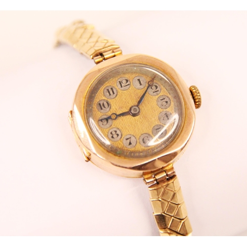 92 - An Art Deco style 9ct yellow gold ladies wristwatch, the circular gold coloured dial with Arabic num... 