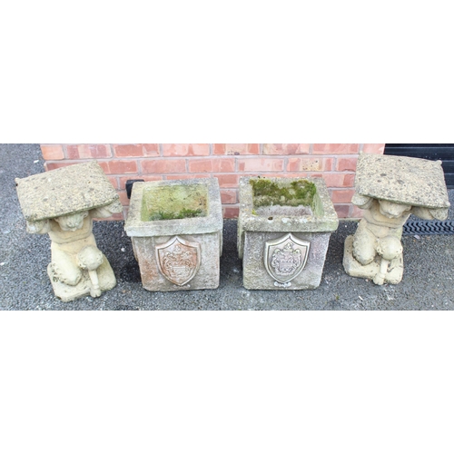 832 - A pair of reconstituted stone garden plinths, each designed as a kneeling fawn supporting a cushion,... 