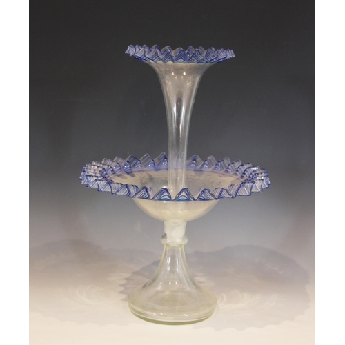 490 - A milk glass epergne, with a central trumpet over three smaller trumpets, all with crimped clear gla... 