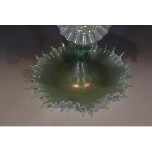 492 - A Fenton pale green iridescent glass epergne, with central trumpet over three smaller trumpets, each... 