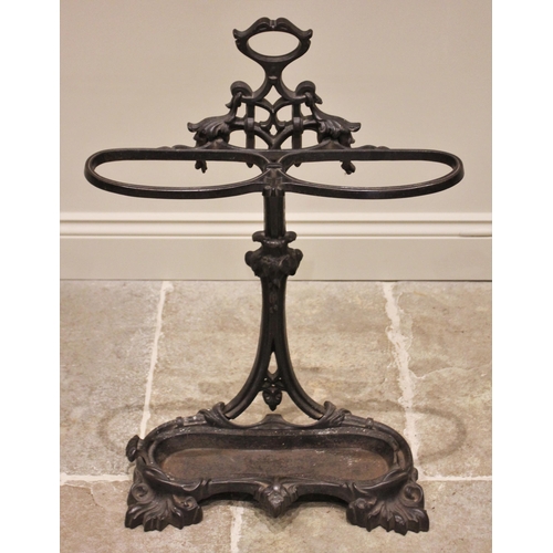 539 - A Coalbrookdale style cast iron stick stand, the pierced and intertwined upright supporting a pair o... 