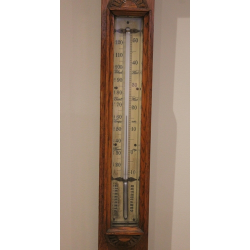 696 - A Victorian carved oak stick barometer, signed Newton & Co, 3 Fleet Street, Temple Bar, London, circ... 