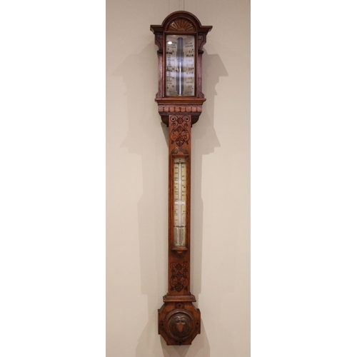 696 - A Victorian carved oak stick barometer, signed Newton & Co, 3 Fleet Street, Temple Bar, London, circ... 