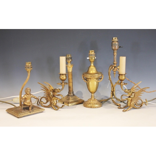 527 - A collection of six brass and gilt metal desk lamps, to include a pair modelled as griffins, 20cm H,... 