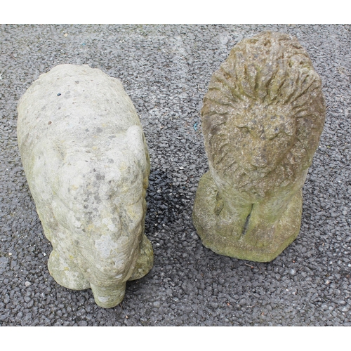 806 - Two reconstituted stone garden ornaments, one modelled as a seated lion, the other as an elephant, 4... 