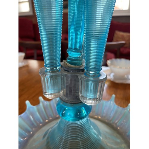 491 - Two pale blue vaseline glass epergnes, each with a central trumpet over three smaller trumpets, each... 