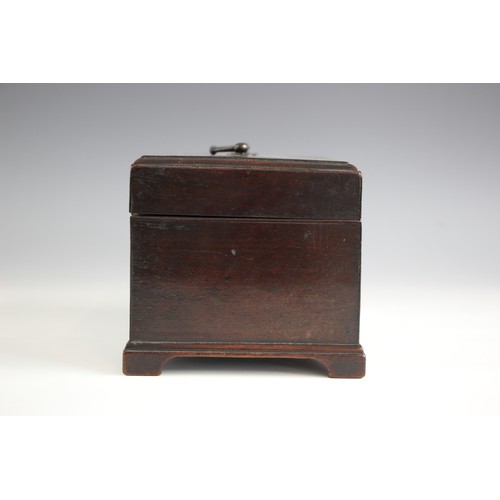 680 - A George III mahogany tea caddy, of rectangular form with lip moulded hinged cover, opening to a vac... 