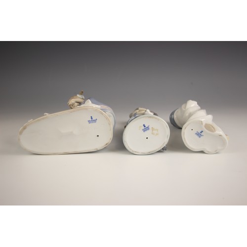 457 - Eight Lladro figures, late 20th century, comprising: a boxed 