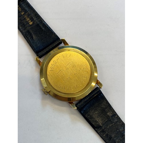 86 - A Mappin & Webb 18ct gold commemorative wristwatch, celebrating the silver jubilee of HM Queen Eliza... 