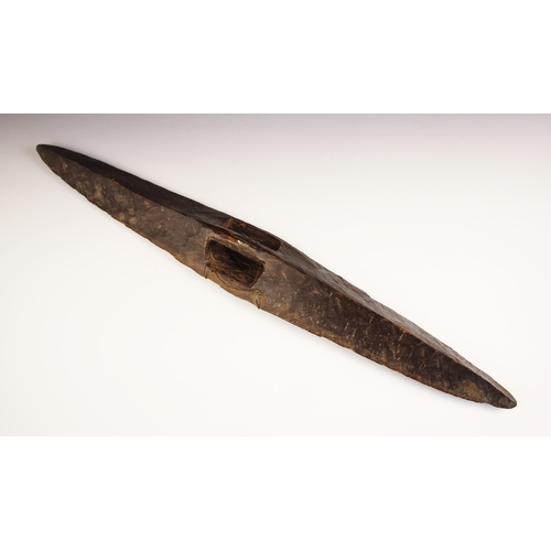 102 - A 19th century South Eastern Australia Aboriginal shield with carved decoration and carved handle to... 