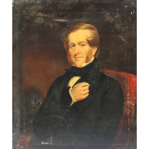 122 - * English school (19th century),  
Half length portrait of a seated gentleman in frock coat with bla... 