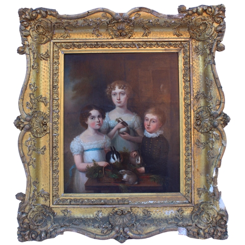 129 - Circle of Margaret Carpenter (1793-1872),  
Three Vawdrey children and their pet rabbits,  
Oil on c... 