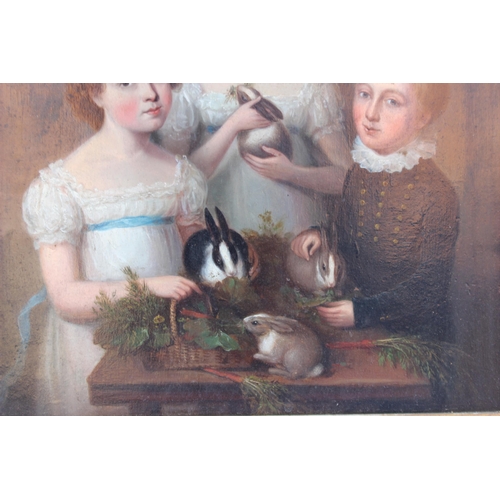 129 - Circle of Margaret Carpenter (1793-1872),  
Three Vawdrey children and their pet rabbits,  
Oil on c... 