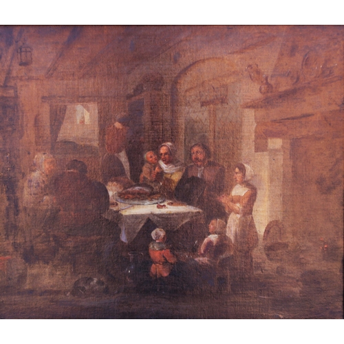 150 - Dutch school (17th century),  
An interior scene with family dining before the hearth,  
Oil on canv... 