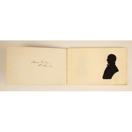 221 - * A Victorian notebook containing seven pasted-in bust length papercut portrait silhouettes, depicti... 