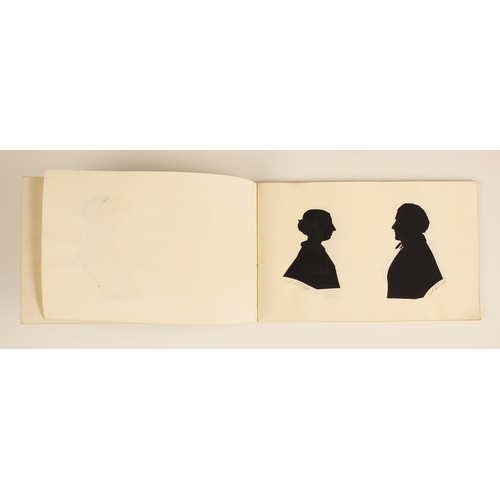 221 - * A Victorian notebook containing seven pasted-in bust length papercut portrait silhouettes, depicti... 