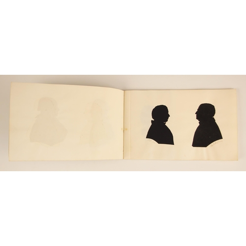 221 - * A Victorian notebook containing seven pasted-in bust length papercut portrait silhouettes, depicti... 