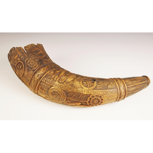 275 - A carved Swedish powder horn, 16th century, extensively carved with a soldier and canon, incised 'BE... 