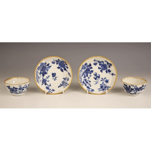 343 - A pair of German hard paste porcelain blue and white tea bowls and saucers, late 18th century, each ... 