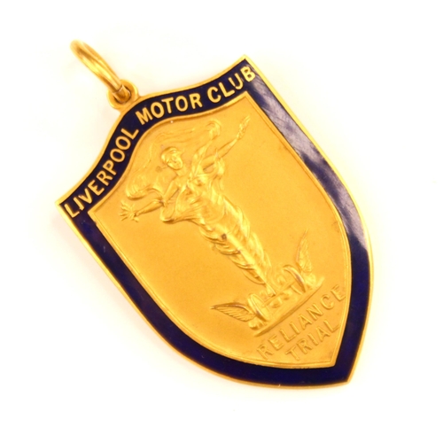 36 - A 9ct yellow gold ‘Liverpool Motor Club’ medal, the shield shaped medal with blue enamel border and ... 