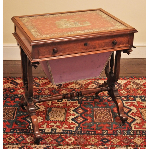 672 - * An early Victorian rosewood sewing/work table, the rectangular moulded and glazed top enclosing a ... 