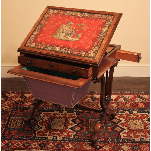 672 - * An early Victorian rosewood sewing/work table, the rectangular moulded and glazed top enclosing a ... 