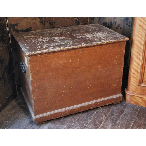 681 - * A Victorian scumbled pine country house trunk/chest, applied with iron side swing handles over a p... 