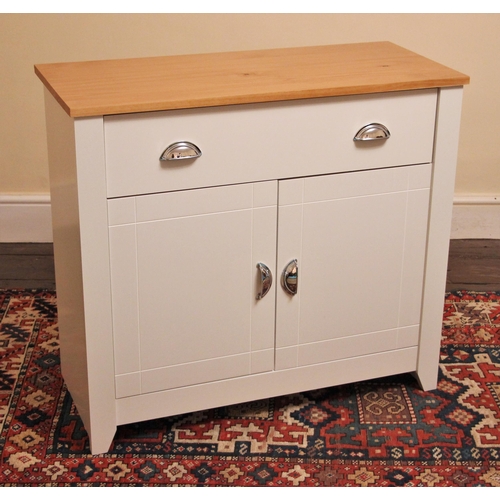 683 - * A contemporary painted and pine bathroom cabinet, the pine top above a single drawer and a pair of... 