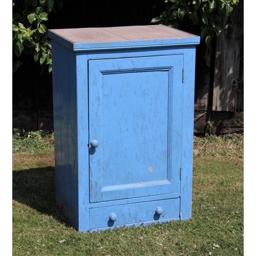 688 - * A Victorian blue painted pine side cabinet, the single panelled door opening to a single shelf abo... 