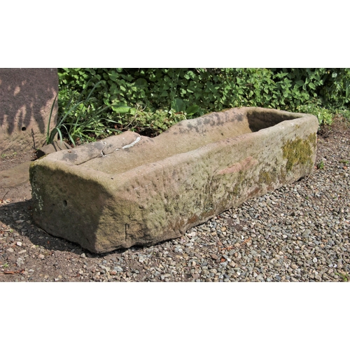 700 - * A rectangular sandstone trough 35cm H x 167cm W x 55cm D