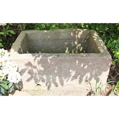 701 - * A rectangular sandstone trough 50cm H x 121cm W x 90 D