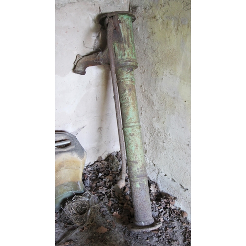 704 - * A cast iron water pump, 137cm H, with another (at fault)