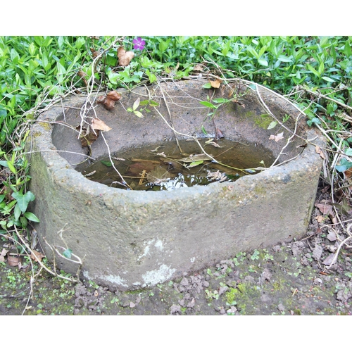 709 - * A reconstituted stone oval water trough, 51cm W