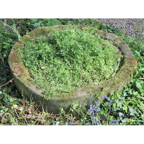 713 - * A circular sandstone trough, 30cm H x 90cm D