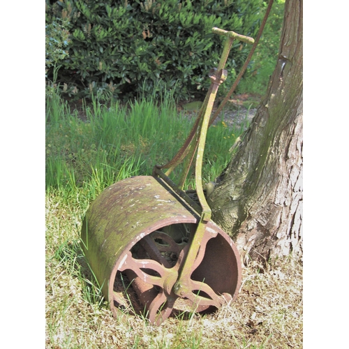 722 - * A cast iron garden roller, 57cm W