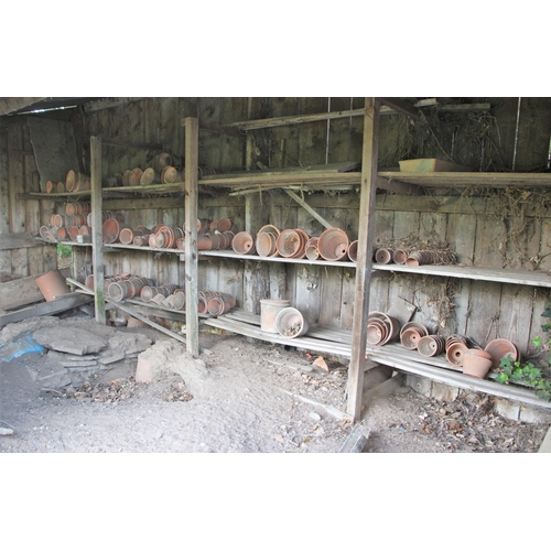 732 - * A quantity of Edwardian and later terracotta garden pots, many named and stamped (Qty)