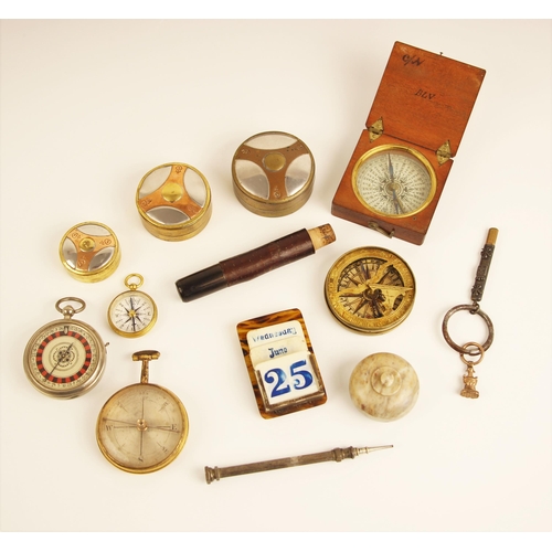 74 - A selection of compasses, including a brass pocket compass and sundial, 20th century, with paper ins... 