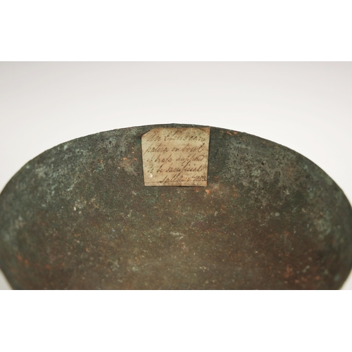 93 - An Etruscan bronze bowl, possibly 2nd century B.C.–2nd century A.D., of simple design, with applied ... 