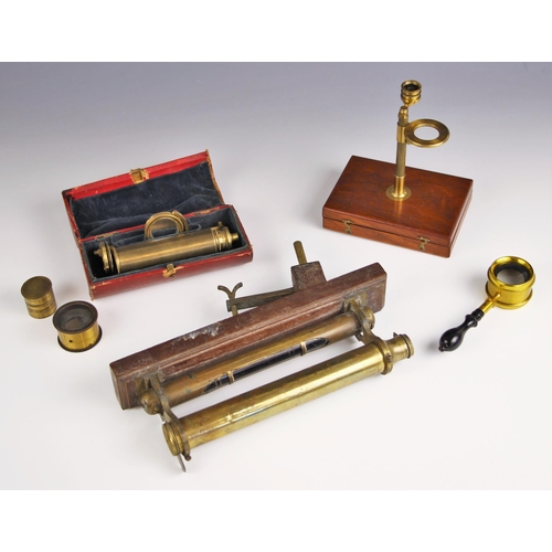 250A - A Banks type lacquered brass simple type pocket microscope, early 19th century, to a fitted mahogany... 