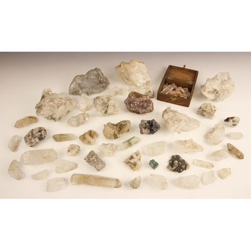 47 - A collection of quartz crystals, predominantly colourless quartz examples of various sizes, also inc... 